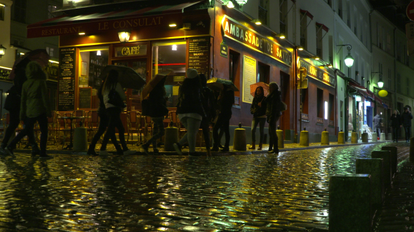 A rainy night scene in Montparnasse