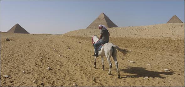 Barry Braverman on horseback at the Great Pyramids in Egypt