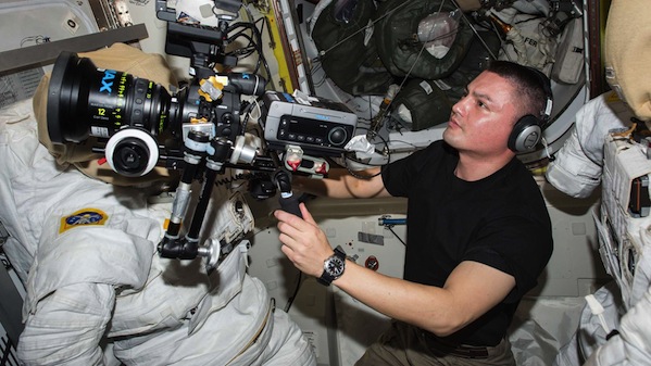 NASA astronaut Kjell Lindgren behind the fully rigged Canon / Imax camera.