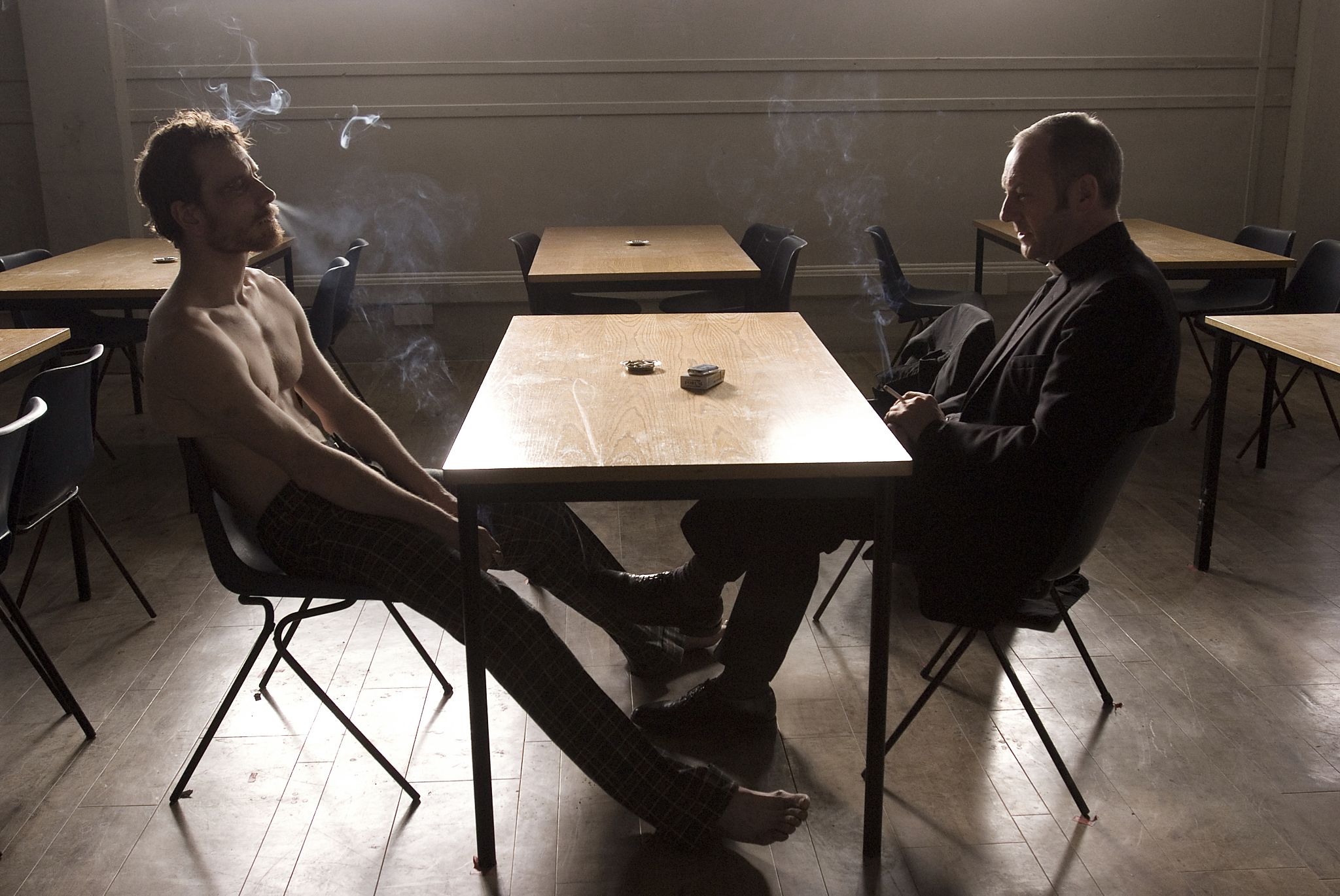 Michael Fassbender and Liam Cunningham in <i>Hunger</i>