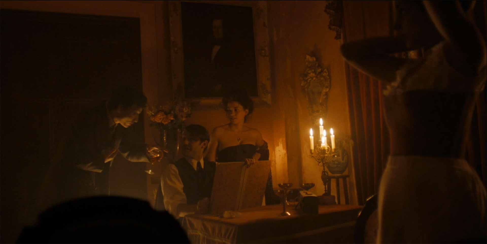 A candlelit scene from <i>Genius: Picasso</i> "Chapter One"