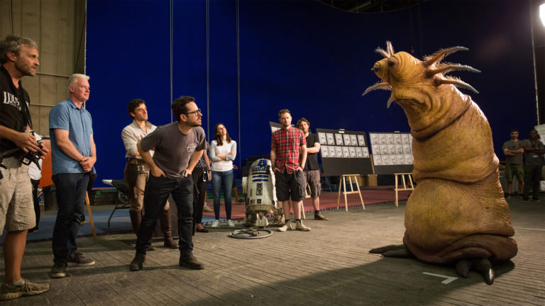 Director J.J. Abrams (leaning forward) on the set of Star Wars: The Rise of Skywalker